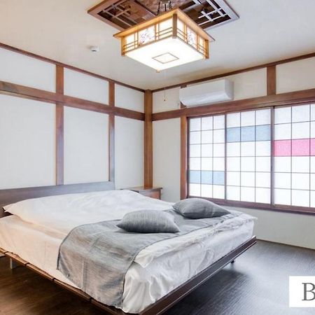 北巽サクラハウス一軒家 Sakura House Guest House Kitatatsumi 最大16名 โอซาก้า ภายนอก รูปภาพ